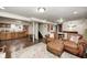 Finished basement with a cozy seating area and a bar, ideal for entertaining and relaxation at 438 N 11Th Ave, Beech Grove, IN 46107