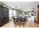Bright dining room with stylish decor, hardwood floors, and ample seating, perfect for entertaining at 438 N 11Th Ave, Beech Grove, IN 46107