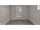Bedroom with window providing natural light and serene views at 4618 W Beecher St, Indianapolis, IN 46241