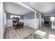 Bright dining area features wood floors, wainscoting, and elegant decor at 4644 Shelby Cir, Greenwood, IN 46143