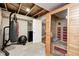 Basement exercise area features a sauna, heavy bag and workout accessories at 4644 Shelby Cir, Greenwood, IN 46143