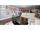 Comfortable living room with stylish seating, wood floors, and Route 66 decor at 4644 Shelby Cir, Greenwood, IN 46143