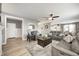 Spacious living room featuring hardwood floors, comfortable seating, and neutral decor at 4644 Shelby Cir, Greenwood, IN 46143