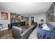 Inviting living room with stylish decor, comfortable seating, and a mini bar at 4644 Shelby Cir, Greenwood, IN 46143