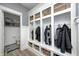 Mudroom with built-in storage, hooks, and cubbies for organization at 4644 Shelby Cir, Greenwood, IN 46143