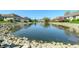 Beautiful pond view surrounded by well-maintained lawns and mature trees at 4858 Brentridge Pl, Greenwood, IN 46143