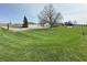 Expansive backyard with lush lawn, mature trees, and room for recreation and relaxation at 4902 N 700 W, McCordsville, IN 46055