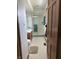 Bright bathroom featuring a vanity, shower with glass door, and tile floor at 4902 N 700 W, McCordsville, IN 46055