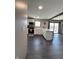This spacious kitchen has an island with bar seating and lots of natural light at 4902 N 700 W, McCordsville, IN 46055