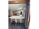 Eat-in kitchen has bar seating and views into other rooms at 4902 N 700 W, McCordsville, IN 46055