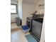 The laundry room features modern washer and dryer, providing efficient laundry solutions at 4902 N 700 W, McCordsville, IN 46055
