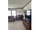 Relaxing living room featuring a piano, seating, and natural light at 4902 N 700 W, McCordsville, IN 46055