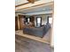 Living room featuring a large sectional sofa and built-in entertainment center at 4902 N 700 W, McCordsville, IN 46055