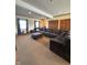 Spacious living room featuring a large sectional sofa and plush carpeting at 4902 N 700 W, McCordsville, IN 46055
