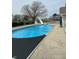 In-ground pool with slide, promising refreshing relaxation and fun on sunny days at 4902 N 700 W, McCordsville, IN 46055