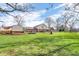 Large, grassy backyard offering plenty of space for outdoor activities, sheds, and lush green space at 4930 Founders Ct, Anderson, IN 46017