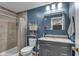 Updated bathroom features a vanity with a marble countertop and a shower with tile surround at 4930 Founders Ct, Anderson, IN 46017