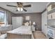 This bedroom features a ceiling fan, wardrobe and built-in storage shelves at 4930 Founders Ct, Anderson, IN 46017