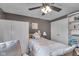 Bright bedroom with closet space, shelving, and a soft, inviting bed at 4930 Founders Ct, Anderson, IN 46017
