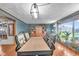 Spacious conference room with wood floors, large windows, and plants at 4930 Founders Ct, Anderson, IN 46017