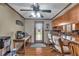 Bright kitchen featuring a breakfast bar, stainless steel appliances, and view of the backyard at 4930 Founders Ct, Anderson, IN 46017