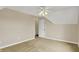 Spacious bedroom with neutral walls, plush carpeting and a ceiling fan at 4932 Willow Ridge Ct, Zionsville, IN 46077