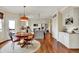 Bright eat-in kitchen with white cabinets, stainless steel appliances, and a center island at 4932 Willow Ridge Ct, Zionsville, IN 46077