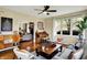 Living room with hardwood floors, lots of natural light, and stylish decor at 4932 Willow Ridge Ct, Zionsville, IN 46077