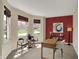 Bright office with bay window offering view of beautifully landscaped exterior at 4932 Willow Ridge Ct, Zionsville, IN 46077