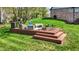 Spacious patio with outdoor seating and fire pit overlooking the lush backyard at 4932 Willow Ridge Ct, Zionsville, IN 46077