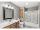 Bathroom featuring a shower, toilet, sink and vanity at 5324 Rolling Meadow Blvd, Indianapolis, IN 46237