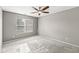 Bedroom with carpeted floor, window and neutral walls at 5324 Rolling Meadow Blvd, Indianapolis, IN 46237