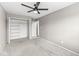 Bedroom with neutral walls, carpet, ceiling fan, and closet at 5324 Rolling Meadow Blvd, Indianapolis, IN 46237