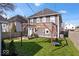 Spacious backyard with a pergola, a deck, and plenty of space for outdoor activities at 549 Keystone Ave, Indianapolis, IN 46201
