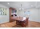 Bright dining room featuring a large table, wooden china cabinet, and ample natural light at 549 Keystone Ave, Indianapolis, IN 46201