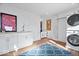 Spacious laundry room featuring modern washer and dryer at 549 Keystone Ave, Indianapolis, IN 46201