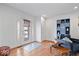 Cozy living room with hardwood floors, a comfortable sofa, and natural light at 549 Keystone Ave, Indianapolis, IN 46201