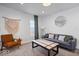 Sitting room offering a cozy vibe, decorated with macrame decor and a couch at 549 Keystone Ave, Indianapolis, IN 46201