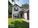 Beautiful two-story home with a well-manicured lawn, arched window, and neutral siding, creating an inviting facade at 563 Jet Stream Blvd, Westfield, IN 46074
