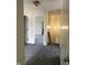 Hallway with neutral walls and new carpet, with the stairway and several doorways to various rooms at 563 Jet Stream Blvd, Westfield, IN 46074