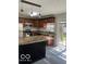 Well-equipped kitchen with stainless steel appliances and granite countertops, featuring a convenient center island at 563 Jet Stream Blvd, Westfield, IN 46074