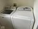 Functional laundry room with modern white washer and dryer units at 563 Jet Stream Blvd, Westfield, IN 46074