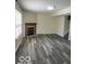 Spacious living room featuring a fireplace and hardwood floors, perfect for entertaining and relaxation at 563 Jet Stream Blvd, Westfield, IN 46074