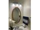 Bright powder room featuring an oval mirror, modern vanity, and decorative accents, providing a convenient and stylish space at 563 Jet Stream Blvd, Westfield, IN 46074