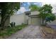 Exterior view of home with attached garage and curb appeal at 5713 Bradston Way, Indianapolis, IN 46237