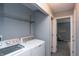 Laundry room with side by side machines and access to Primary bedroom at 5713 Bradston Way, Indianapolis, IN 46237
