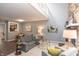 Open-concept living room with view of kitchen and stone fireplace at 5713 Bradston Way, Indianapolis, IN 46237