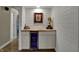 This bar area features a beverage refrigerator, white cabinetry and a butcher block countertop at 601 Ridge Rd, Greenwood, IN 46142