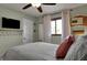 Bedroom with a cozy ambiance and natural light from the window at 601 Ridge Rd, Greenwood, IN 46142