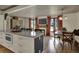 Spacious kitchen with a large island, modern appliances, and dining area with large windows at 601 Ridge Rd, Greenwood, IN 46142